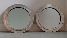 A pair of mid 20th century cruise liner aluminium port-hole mirrors
