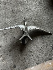 mascotte bouchon de radiateur