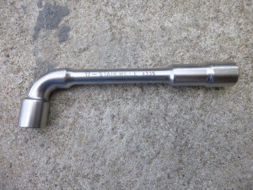 Cle pipe debouchee - a,