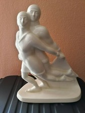 Couple de patineurs barbotine