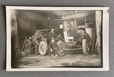 PHOTO old garage repair car bus car car tire wheel men