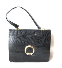 Elégant sac noir vintage en cuir véritable embossé façon reptile.