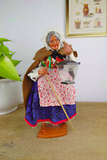 Antique Santon d'Isabelle Fabre - woman with lantern and walking stick