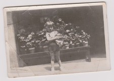 old photo ?️ child in front of flowery window circa 1940