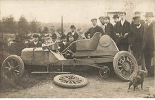 Transportation - automobile - men around a crashed car - dog