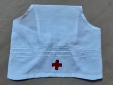 Coiffe blanche avec croix pour