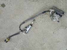 USED 04 Kawasaki KX 85 KX85 Rear Brake Caliper Mount Master Cylinder 43080-5134