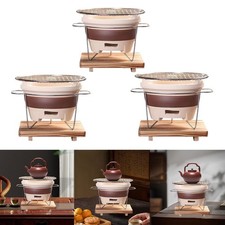 Poêle à charbon de bois en  avec grille métallique, chauffe-théière