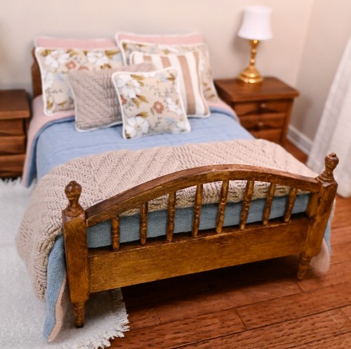 Miniature stained wood queen