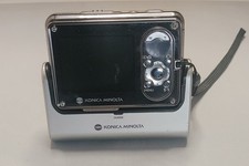 Konica Minolta DiMAGE X1 Camera And Charge Base No USB Cord UNTESTED Anti Shake