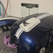 reservoir et caches lateraux