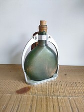 Bottle of Armagnac DUCASTAING on its caliper eb metal leather strap Made In France