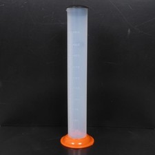 Tube doseur d'huile gradué