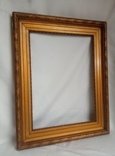 Elégant cadre doré de style