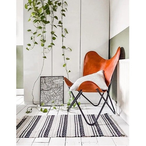 Chaise cuir papillon vintage