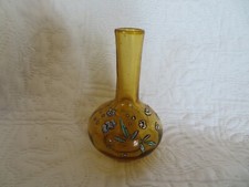 old small enamelled vase with cane blown flower decoration