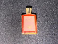 (AB) VINTAGE ARTHUS BERTRAND PERFUME REMINISCENCE PATCHOULI ENAMEL BADGE PINS