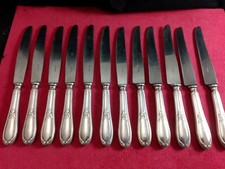 Service de 12 couteaux de