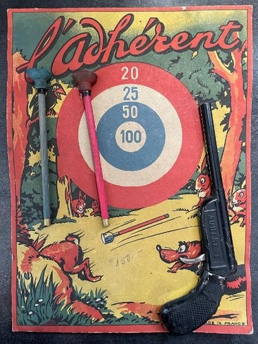 Adhérent pistolet jouet - l'adhérent.,