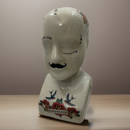 Phrenology head tattooed - head,