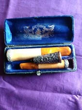       Deux porte cigarette
