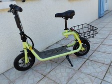 Trotrinette  électrique type draisienne avec porte bagages