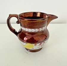 Pichet en cuivre lustré