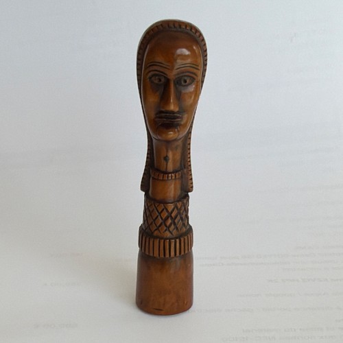 Bourre pipe bois sculpté - en,