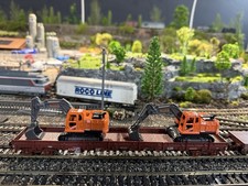 2 pelles mécaniques orange