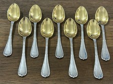 CHRISTOFLE 9 petites cuillères à moka en métal argenté et vermeil, modèle RUBANS