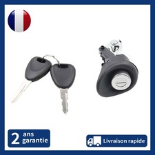 Serrure de coffre avec bouton