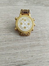 Pin's SEIKO ROLAND GARROS 1990 WATCH - BROWN gold - Arthus Bertrand