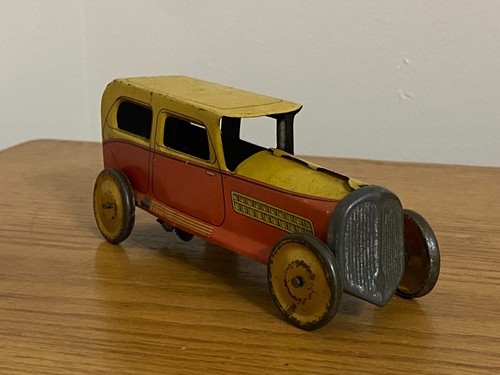 Jouet tin wind toy - tin, wind-up