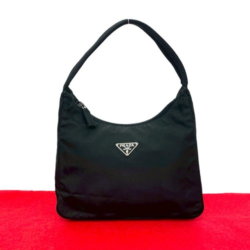 Sac main métal logo - en,
