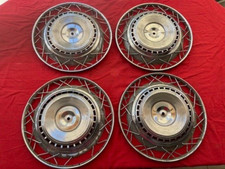 4 ENJOLIVEURS ORIGINE 15"