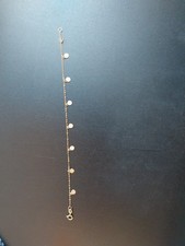 bracelet or jaune 18 carats 750 tête aigle chaîne pampilles