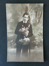CPA Fantasy - Young man in suit tie with bouquet