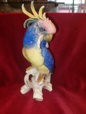 Perroquet En porcelaine