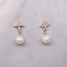 Oreille en or géant perle et