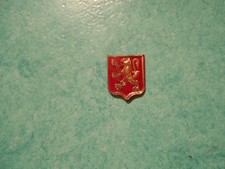 Logo lion rouge et or