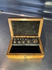 Boite de 10 poids laiton ancien