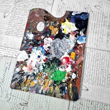 Ancienne palette d'artiste de mélange de couleurs