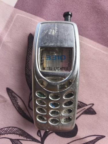 Ancien briquet publicitaire