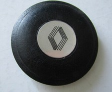 Cache central volant renault.