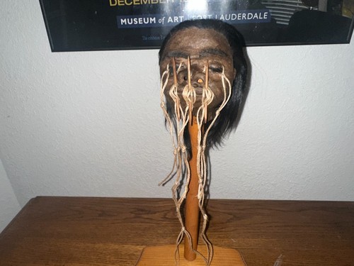 Dark haired with chonta - chonta, spines