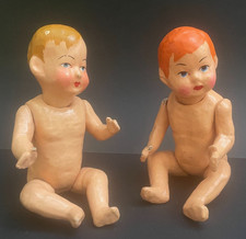 Antique dolls - 2 wallpaper mache doll type dolls - 27 and 29 cm