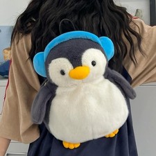 à dos en peluche pingouin