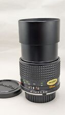 Objectif Minolta MC TELE Rokkor 2.8/135mm avec pare-soleil intégré + bouchons