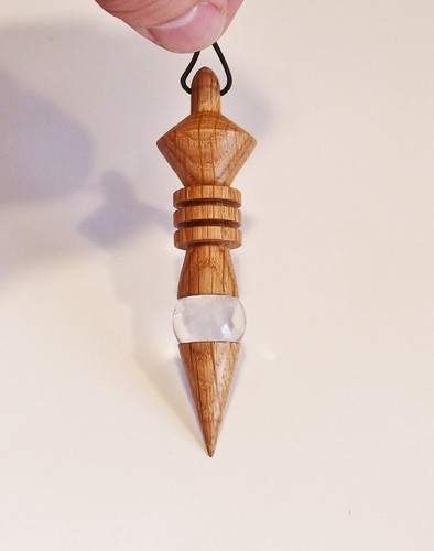 Pendule egyptien en chene - °,