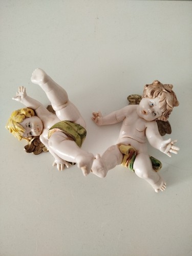Tumbling cherubs - tumbling,